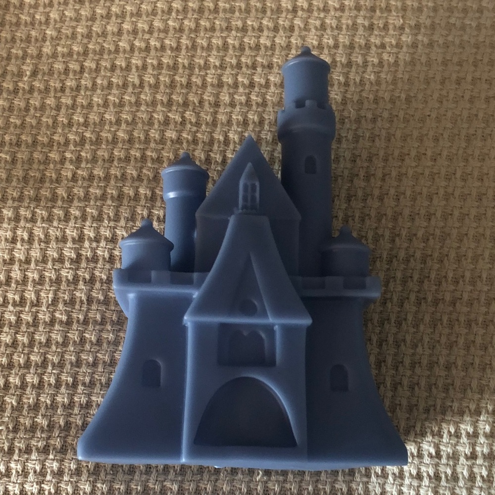 Disney Cinderella Castle with color-change feature.  Soft plastic.